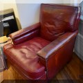 F77. Red leather club chair. 